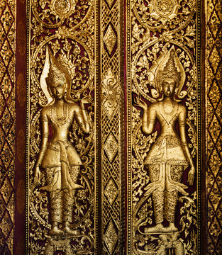 detail of temple door, Wat Mai Suwannaphumaham, Luang Prabang, Loas, Southeast Asia