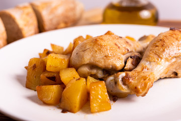 Roasted chicken legs with potatoes
