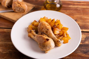 Roasted chicken legs with potatoes