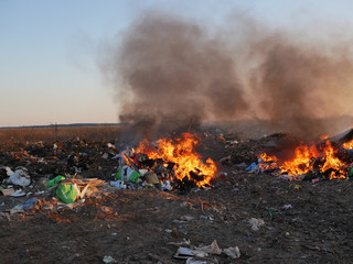burning garbage. concern for the environment. environmental pollution.