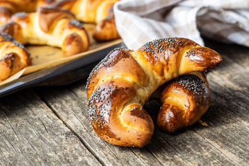 Sweet homemade croissants with poppy.