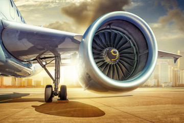 jet engine of an modern airliner against a skyline - obrazy, fototapety, plakaty