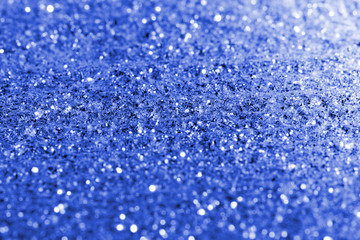 blurred blue glitter texture festive abstract background, workpiece for design, soft focus