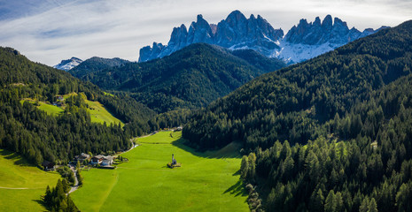 Landscapes with San Giovanni Church and small village in Val di Funes, Dolomite Alps, South Tyrol,...