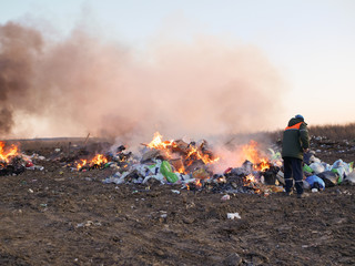 burning garbage. concern for the environment. environmental pollution.