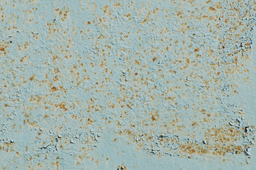 Iron fence. Iron old door. Old paint on the door, the fence.