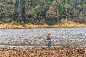 Fototapeta na wymiar Man fishing in the lake