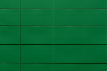 Green background from rectangular tiles. Idea for a designer