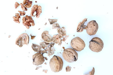 Superfoods - Nuts - Cracked walnuts on white background