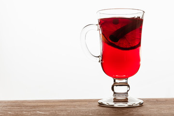 Glass of mulled wine on a light background