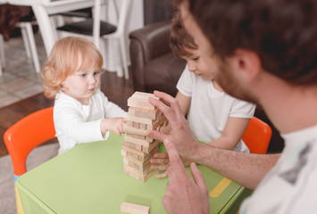 Father's day. Daddy Spend Time with children. Happy Holiday. Father  plays with children. Spending time at home.