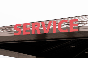 Fototapeta premium Service sign on a roof of the building