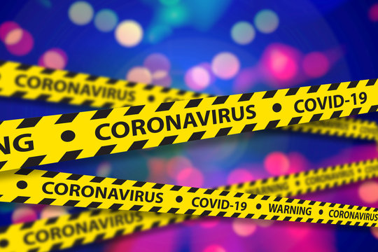 Corona Virus Covid-19 Warning Tape Barrier In Front Of Defocused Background