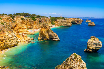 Fototapeta premium Praia da Marinha, beautiful beach Marinha in Algarve, Portugal. Navy Beach (Praia da Marinha), one of the most famous beaches of Portugal, located on the Atlantic coast in Lagoa Municipality, Algarve.
