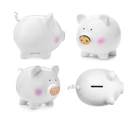 Set with ceramic piggy bank on white background
