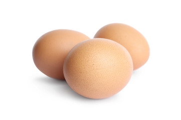 Fresh brown chicken eggs isolated on white