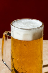 A pint of blonde beer, Ale or Lager, on a sunny day