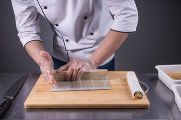 chef cooking rolls in restaurant kitchen2