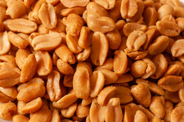 Close up shot of salted peanuts