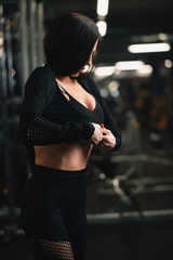 Fitness woman on training. Young woman in the gym.	