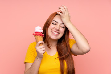 Young girl with a cornet ice cream over isolated background has realized something and intending the solution