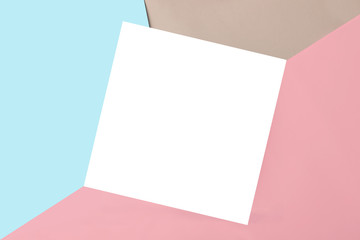Geometrical multicolored background with isolated square place for text or design.Trendy pastel colors - pink.blue and classic grey.