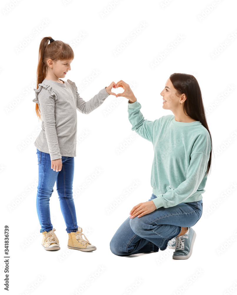 Wall mural happy woman with little adopted girl on white background