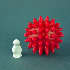 Abstract model of a strain of the virus of the corona virus disease COVID-19 and human with copy...