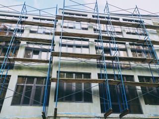 Scaffolding to repair the facade of the building