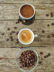 Cup and grain of coffee