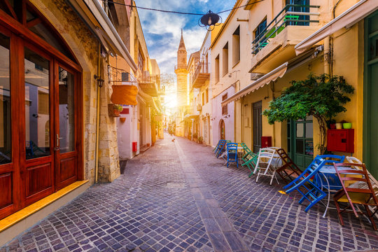 Fototapeta Street in the old town of Chania, Crete, Greece. Charming streets of Greek islands, Crete. Beautiful street in Chania, Crete island, Greece. Summer landscape. Chania old street of Crete island Greece.