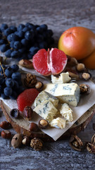 Blue cheese with fruits and nuts. Cheese Set. Healthy food.