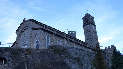Fototapeta na wymiar San Costanzo Church, resting on a rocky spur, it overlooks the city