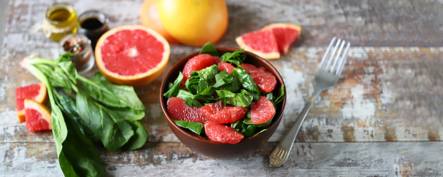 Super fresh salad with grapefruit and spinach. Vitamin food. Healthy food.