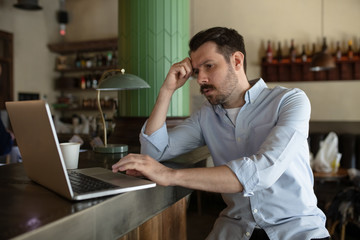 Restaurant, cafe, bar closed due to COVID-19 or Coronavirus outbreak lockdown, stressed owner of small business, depression. Businessman exhausted, upset. Business, economy, finance crisis.