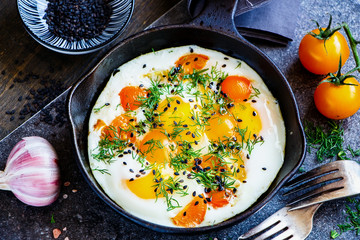Fried eggs in pan