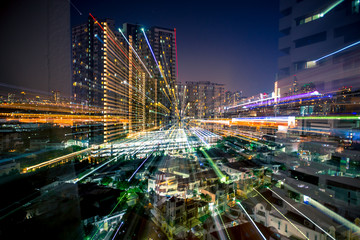 Fototapeta na wymiar Blurred abstract background of light lines from the capital's residences in condominiums, offices, street lights from shopping malls, nighttime beauty