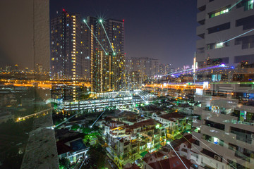 Blurred abstract background of light lines from the capital's residences in condominiums, offices, street lights from shopping malls, nighttime beauty