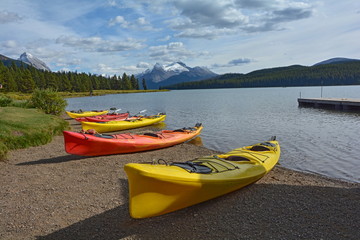 Fototapeta na wymiar Kayaks on Lake Maligne in the Rocky Mountains, Alberta, Canada