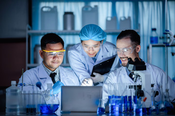 Health care researchers working in medicals science technology research in laboratory