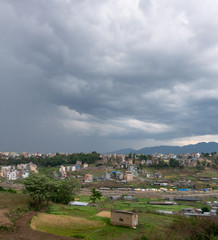 Fototapeta na wymiar The city of Kathmandu, Nepal under the storm clouds of monsoon season.