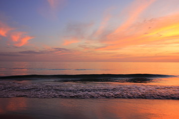 Sea or beach on twilight sky and on the sunset for background.