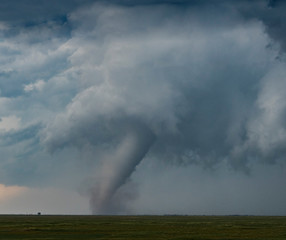 Obraz na płótnie Canvas A tornado on the Great Plains During a Summertime Storm
