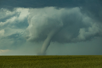 Naklejka na ściany i meble A tornado on the Great Plains During a Summertime Storm