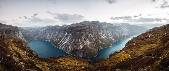 The trailhead for hiking to Trolltunga overlooking the beautiful blue water of the Fjords in Norway