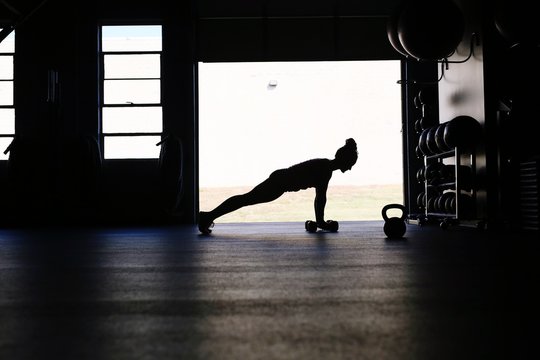 Silhouette Woman Doing Pushups