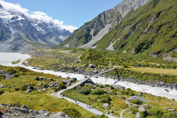 Chain bridge over a river in Hooker Valley, New Zealand