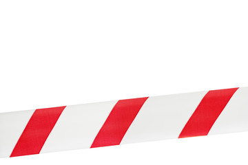 One red and white warning tape on an isolated white background, stretched across. Concept for protecting people from coronavirus infection. Coronavirus, Covid-19