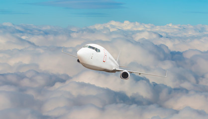Perspective Background - White passenger airplane in the clouds  - Travel by air transport