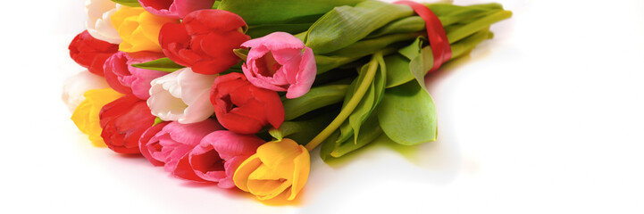 Bouquet of fresh, bright, multi-colored tulips on a white background, isolated.